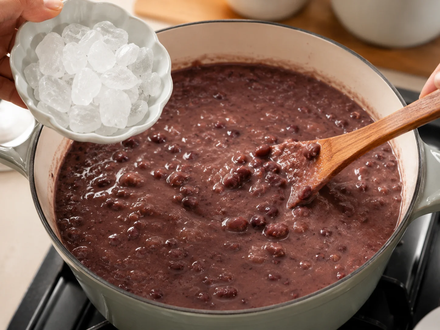 Adding rock sugar to the finished red bean soup